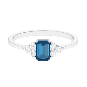 1 CT Emerald Cut London Blue Topaz Solitaire Ring with Diamond Trio