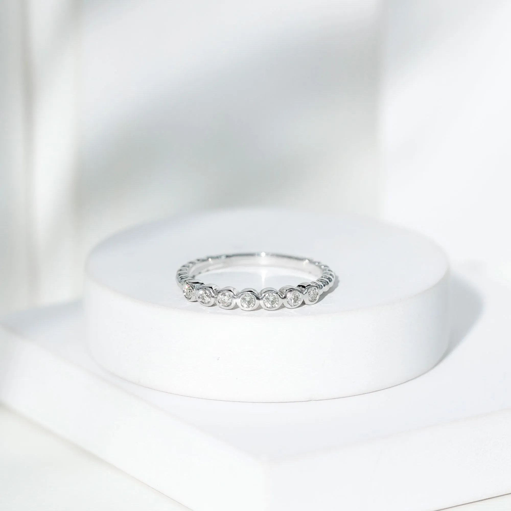 Bezel Set Round Diamond Half Eternity Ring